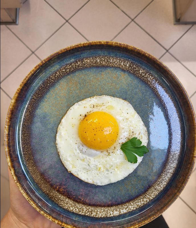 An egg sunnyside up for breakfast